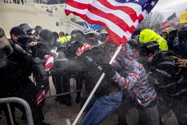 WASHINGTON, DC - JANUARY 6: Trump supporters clash with police and security forces as people try to storm the US Capitol on January 6, 2021 in Washington, DC. Demonstrators breeched security and entered the Capitol as Congress debated the 2020 presidential election Electoral Vote Certification. (photo by Brent Stirton/Getty Images) (Photo by BRENT STIRTON / GETTY IMAGES NORTH AMERICA / Getty Images via AFP)