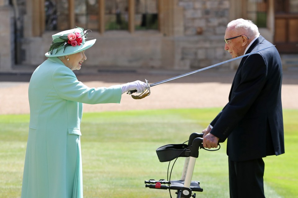 Queen Elizabeth II dubbing Captain Sir Tom Moore a knight at Windsor Castle.