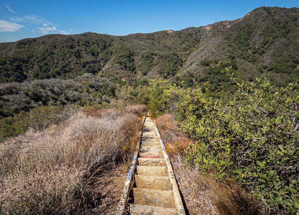 Steps that lead down to and up from Murphy Ranch in Rustic Canyon photographed in August, 2022.