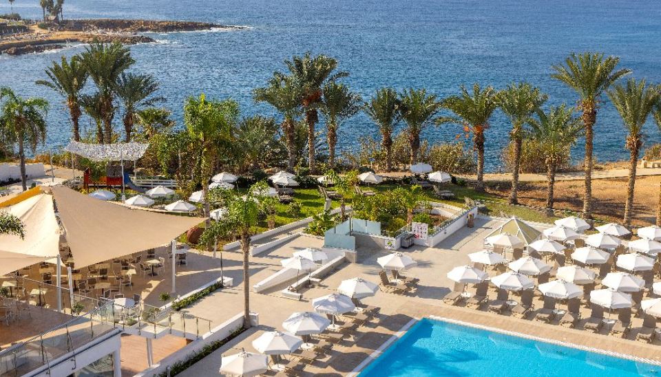 Queens Bay Hotel in Paphos, Cyprus.  Aerial view of the pool, beach, and grounds.