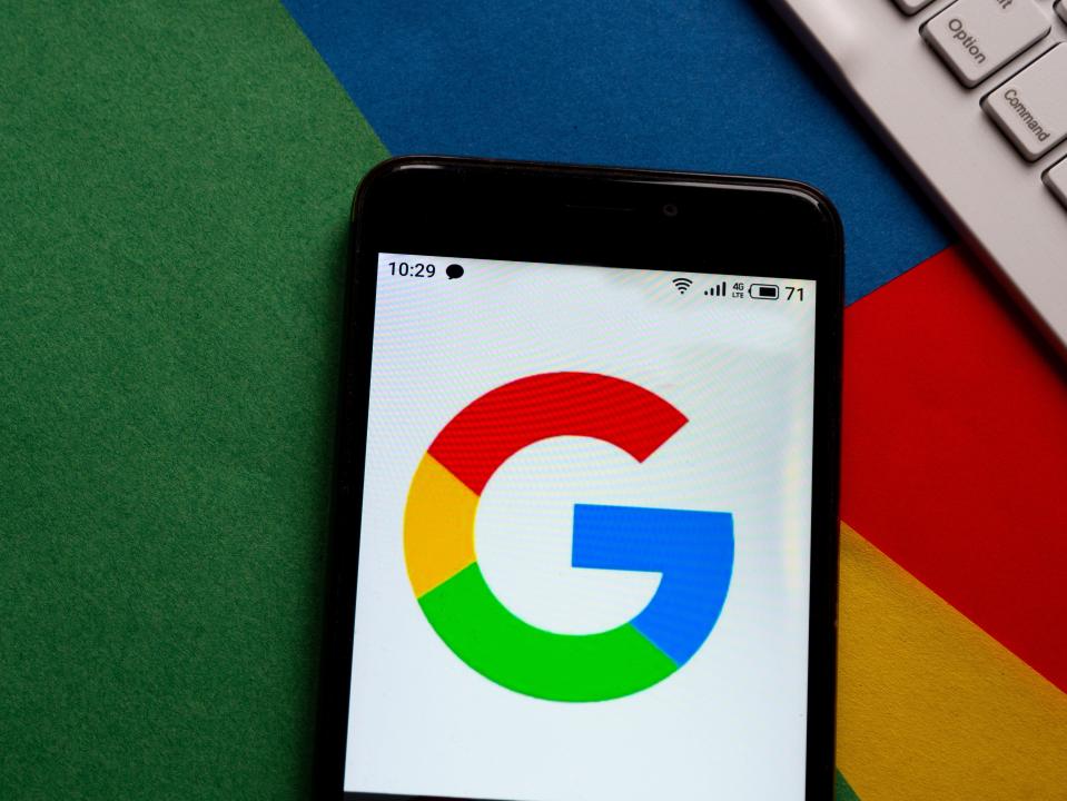 Illustration of the Google logo on a smartphone screen.