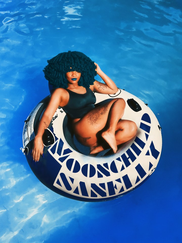 Moonchild Sanelly in a pool float.