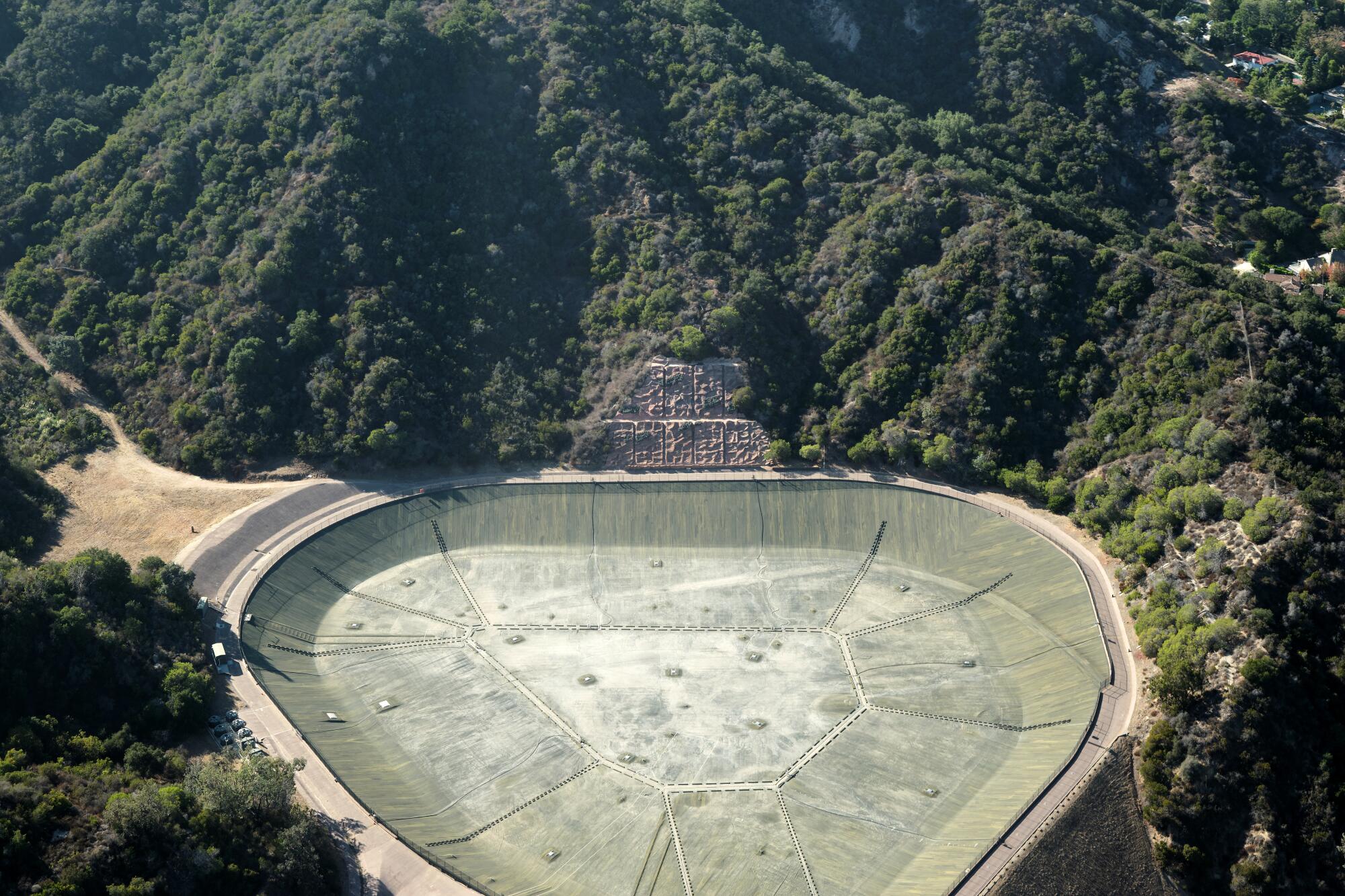 An aerial view of the empty Santa Ynez Reservoir