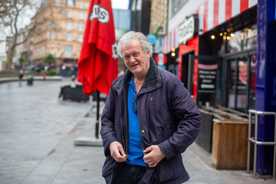 Sir Tim Martin leaving LBC after an interview.