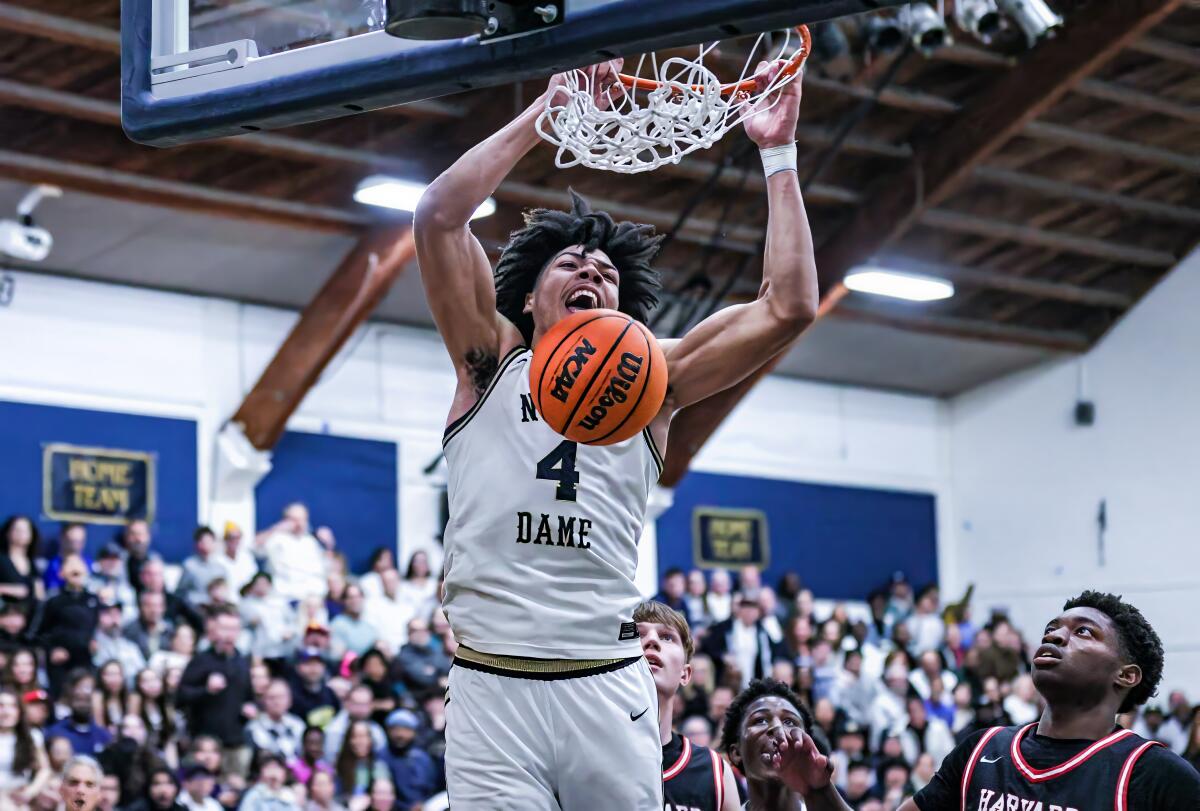 Tyran Stokes of Sherman Oaks Notre Dame gets a dunk against Harvard-Westlake. He had 26 points.