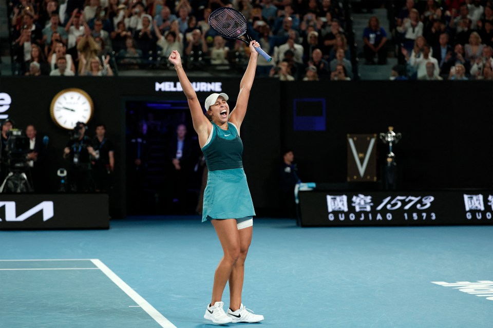 Madison Keys celebrates winning a tennis match.