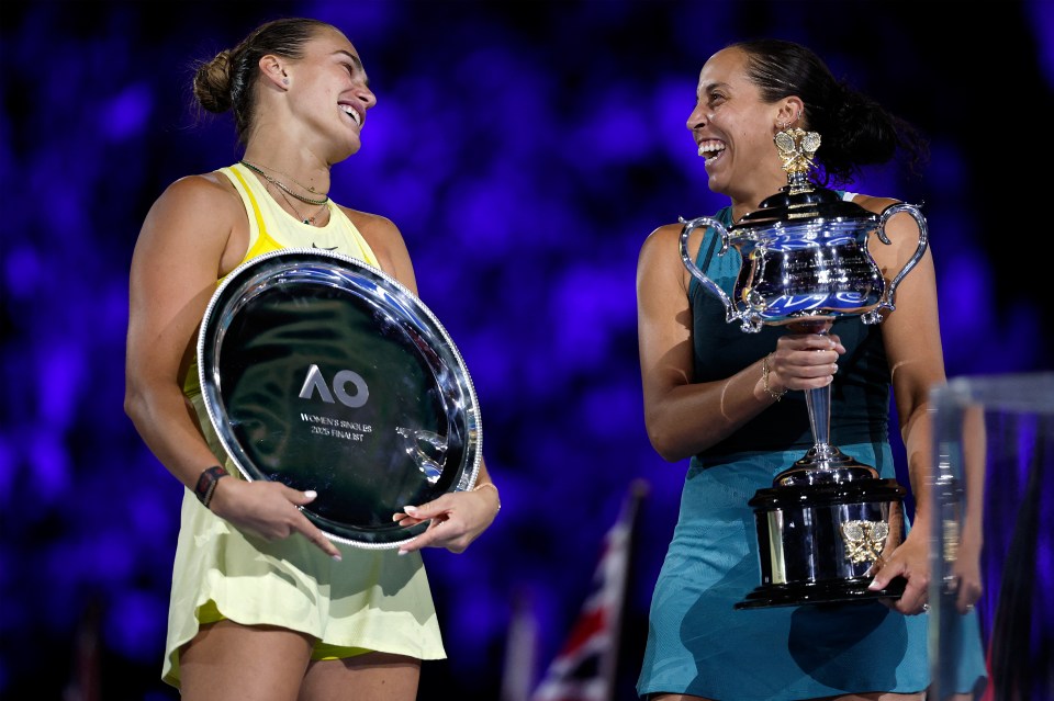 Madison Keys and Aryna Sabalenka holding trophies after the Australian Open women's singles final.