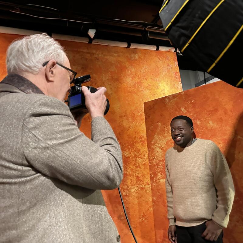 Actor John Lithgow takes a picture of L.A. Times photographer Jason Armond 