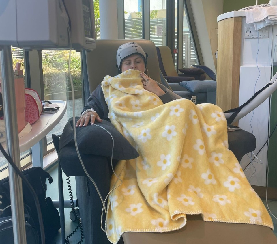 Woman receiving chemotherapy.