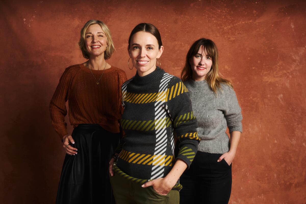 Jacinda Ardern stands with "Prime Minister" filmmakers Michelle Walshe and Lindsay Utz.