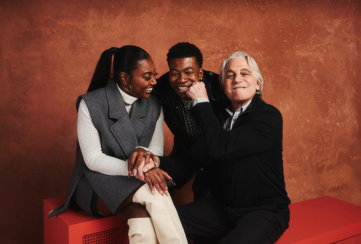 Patina Miller, Mekai Curtis and Tony Danza pose for a photo. Danza is playfully punching Curtis.