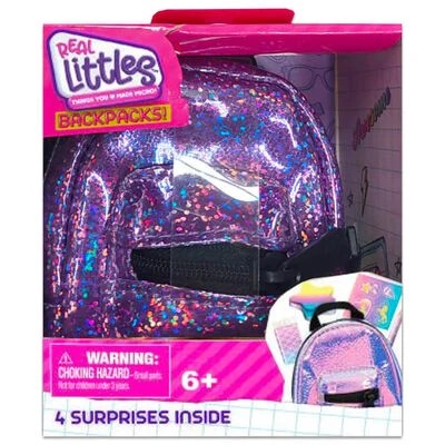 Real Littles Backpacks toy package showing a purple glitter backpack and smaller accessories.