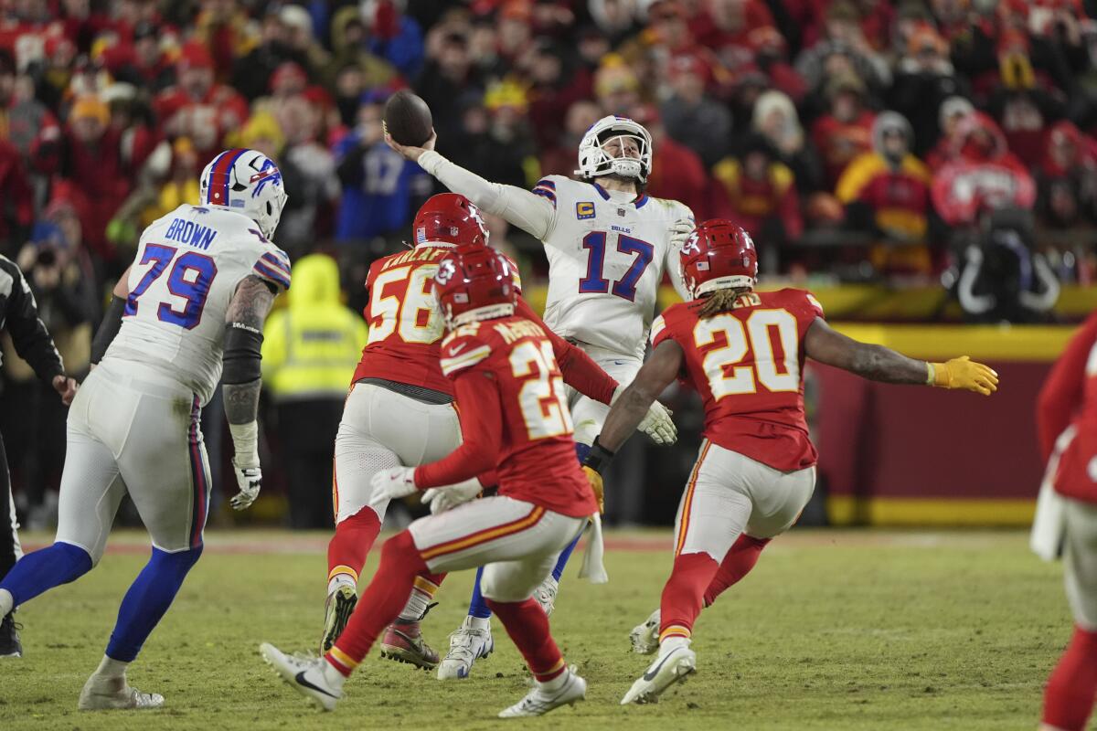 The Chiefs defense kept the pressure on Bills quarterback Josh Allen (17) during the AFC championship game.