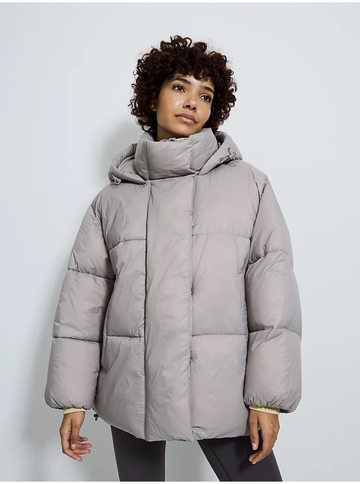 Stone-colored hooded padded coat.