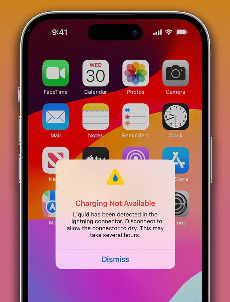 iPhone screen showing a charging error message: Liquid detected in Lightning connector.