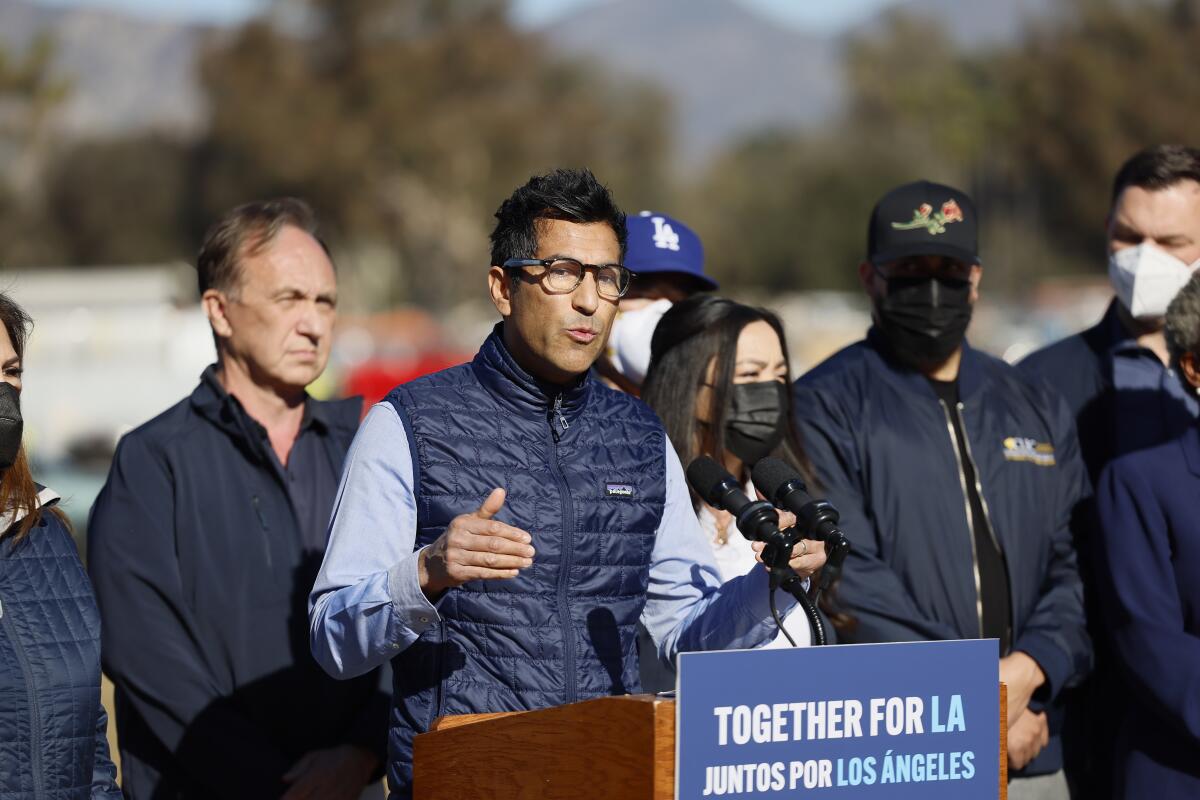 State Assembly Speaker Robert Rivas, center, speaks during a legislative update outside the Rose Bowl in Pasadena on Jan. 16.