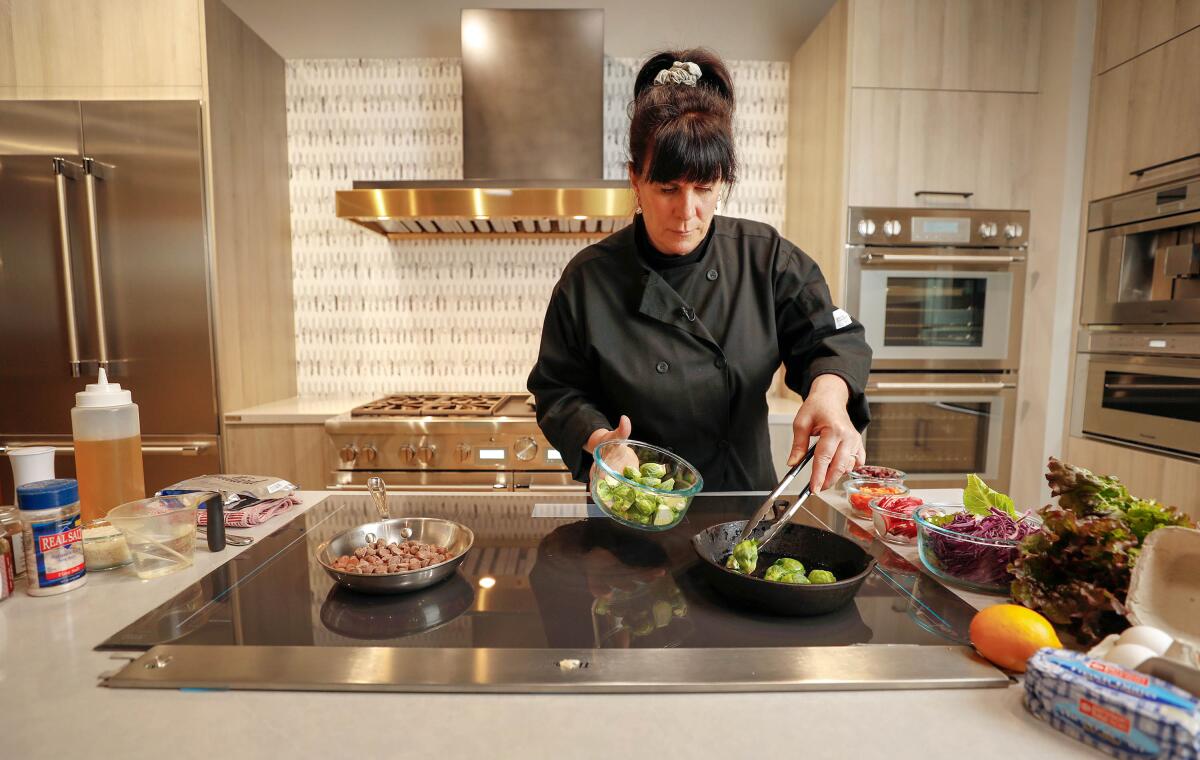 Bridget Bueche demonstrates induction cooking.