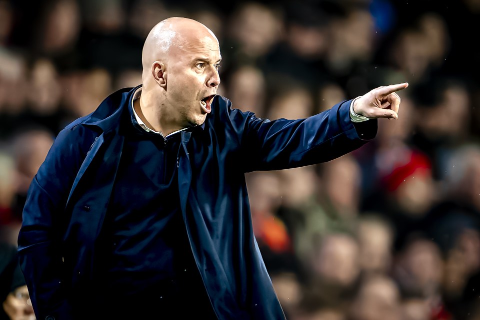 Liverpool FC trainer Arne Slot coaching during a match.