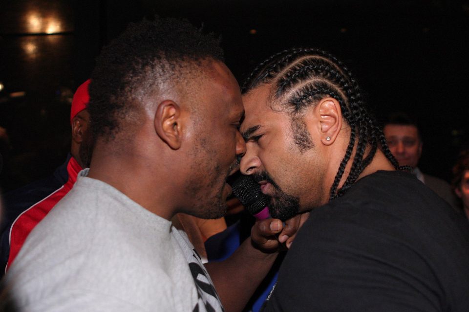 David Haye and Dereck Chisora confronting each other at a news conference.