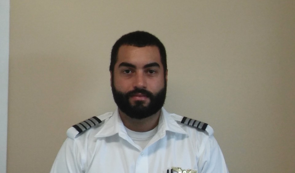 Photo of Jonathan Campos in a pilot uniform.