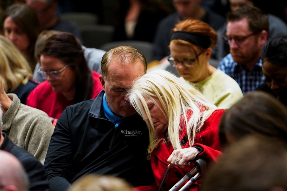 Mourners at a prayer vigil for plane crash victims.