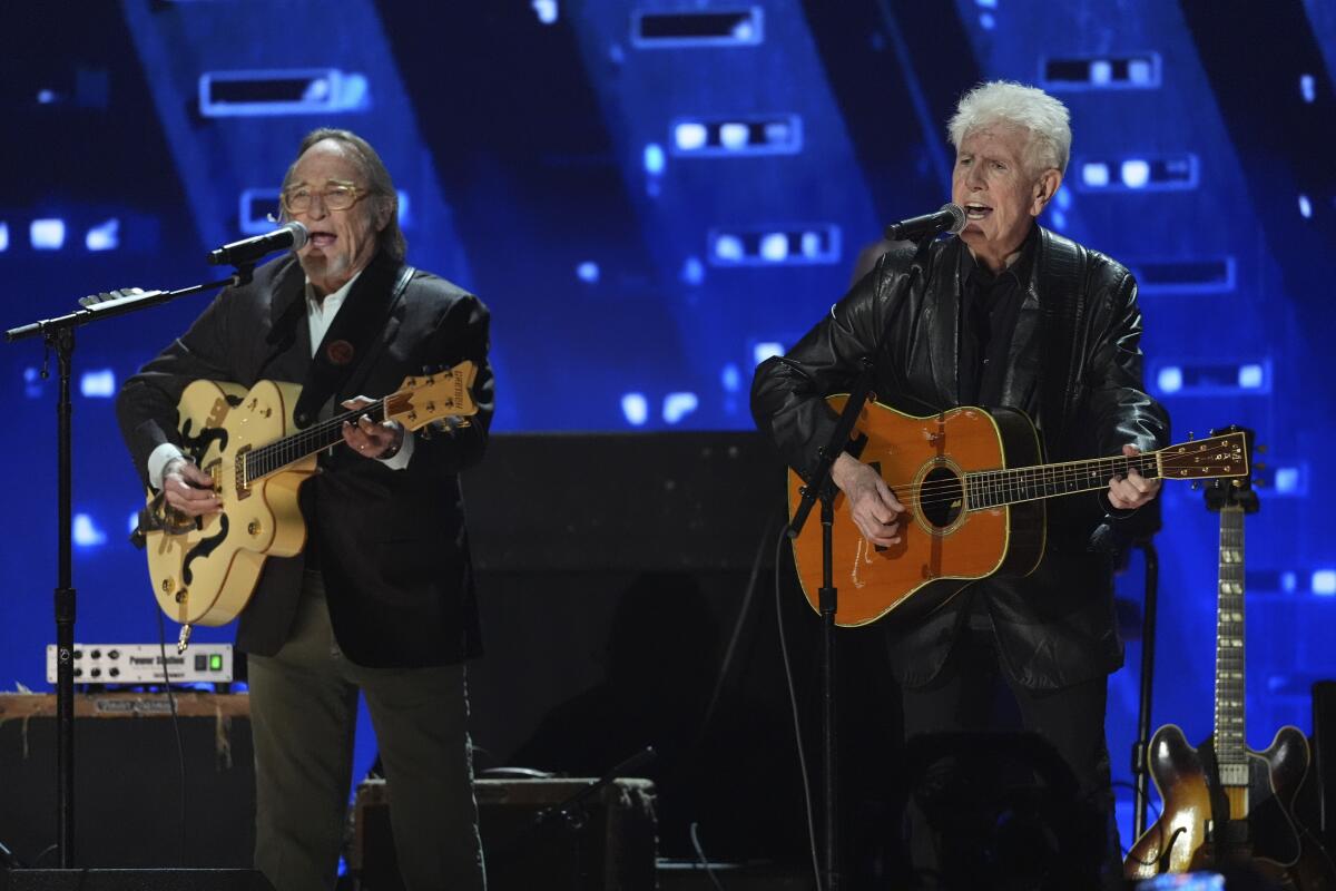 Stephen Stills, left, and Graham Nash at the Forum.