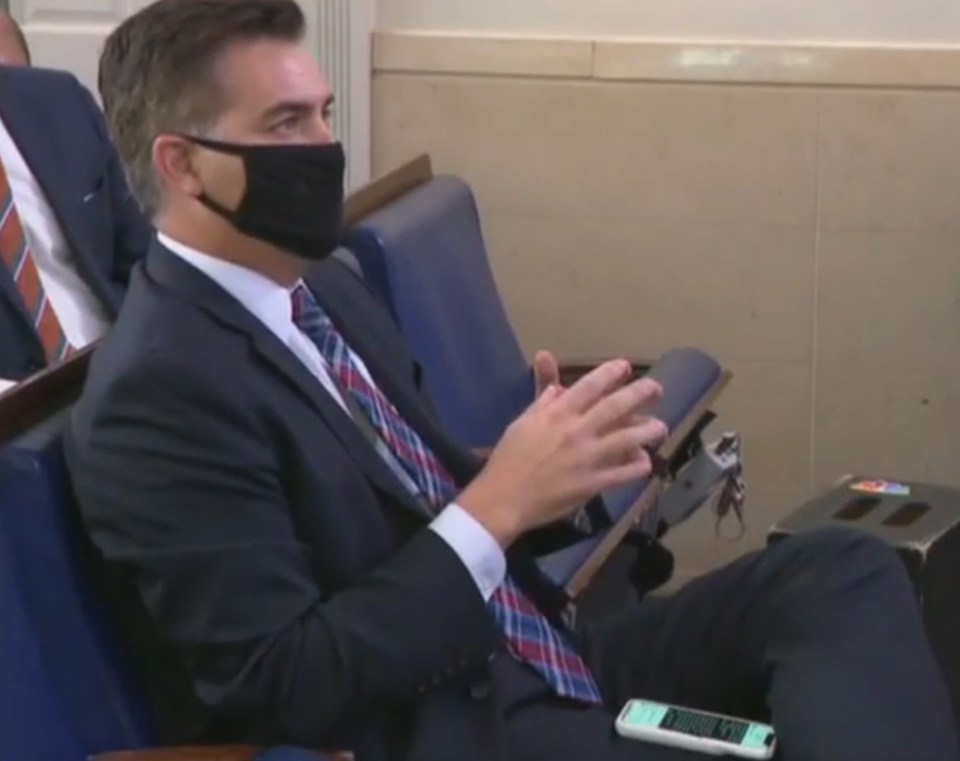 Jim Acosta attends a White House briefing