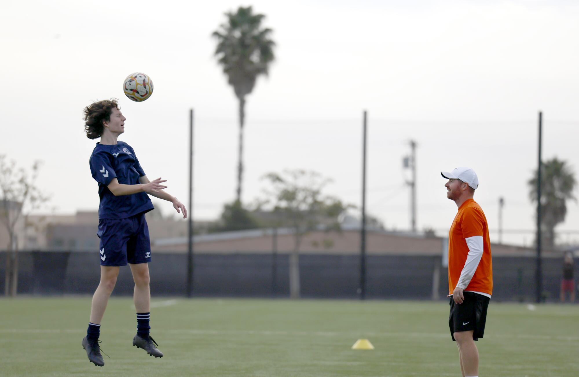 Tristian Eggerling practices with coach/trainer Michael Holzer.