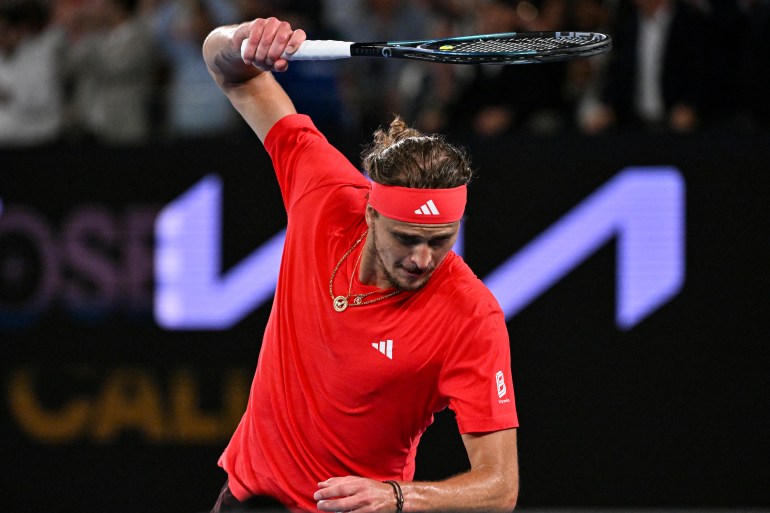 Germany's Alexander Zverev smashes his racket after losing the second set against Italy's Jannik Sinner during their men's singles final match on day fifteen of the Australian Open tennis tournament in Melbourne on January 26, 2025. (Photo by WILLIAM WEST / AFP) / -- IMAGE RESTRICTED TO EDITORIAL USE - STRICTLY NO COMMERCIAL USE --