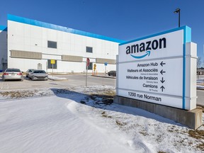 An Amazon warehouse and sign.