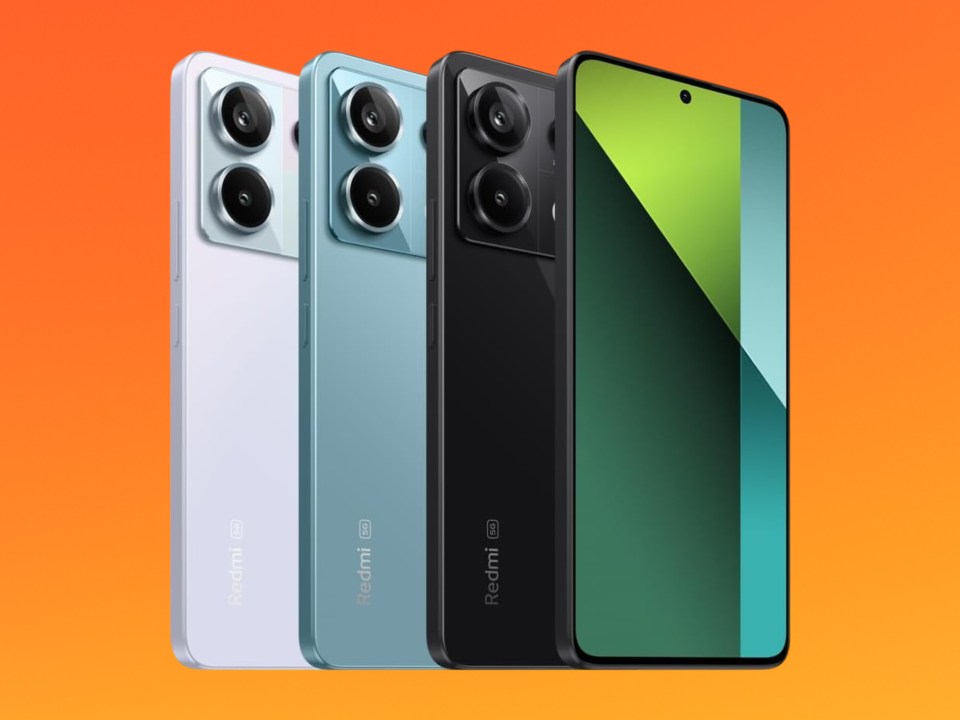 Three Redmi phones in white, light blue, and black, plus a green and black phone.