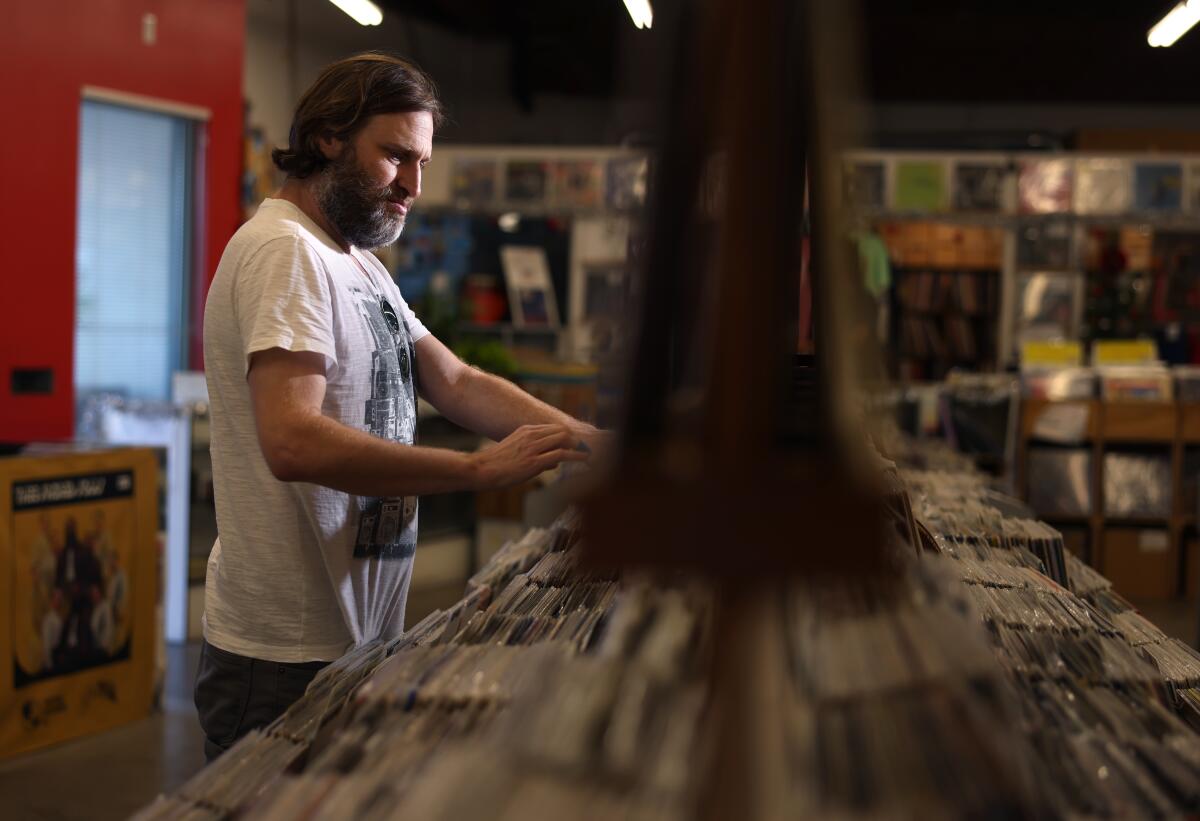 Man in a record store