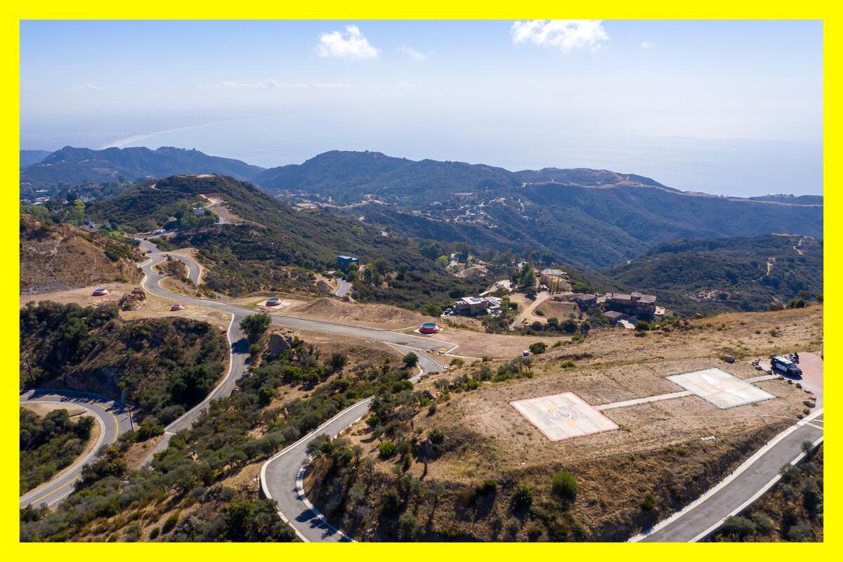 A birds eye view of a helipad and the surrounding Santa Monica Mountains.