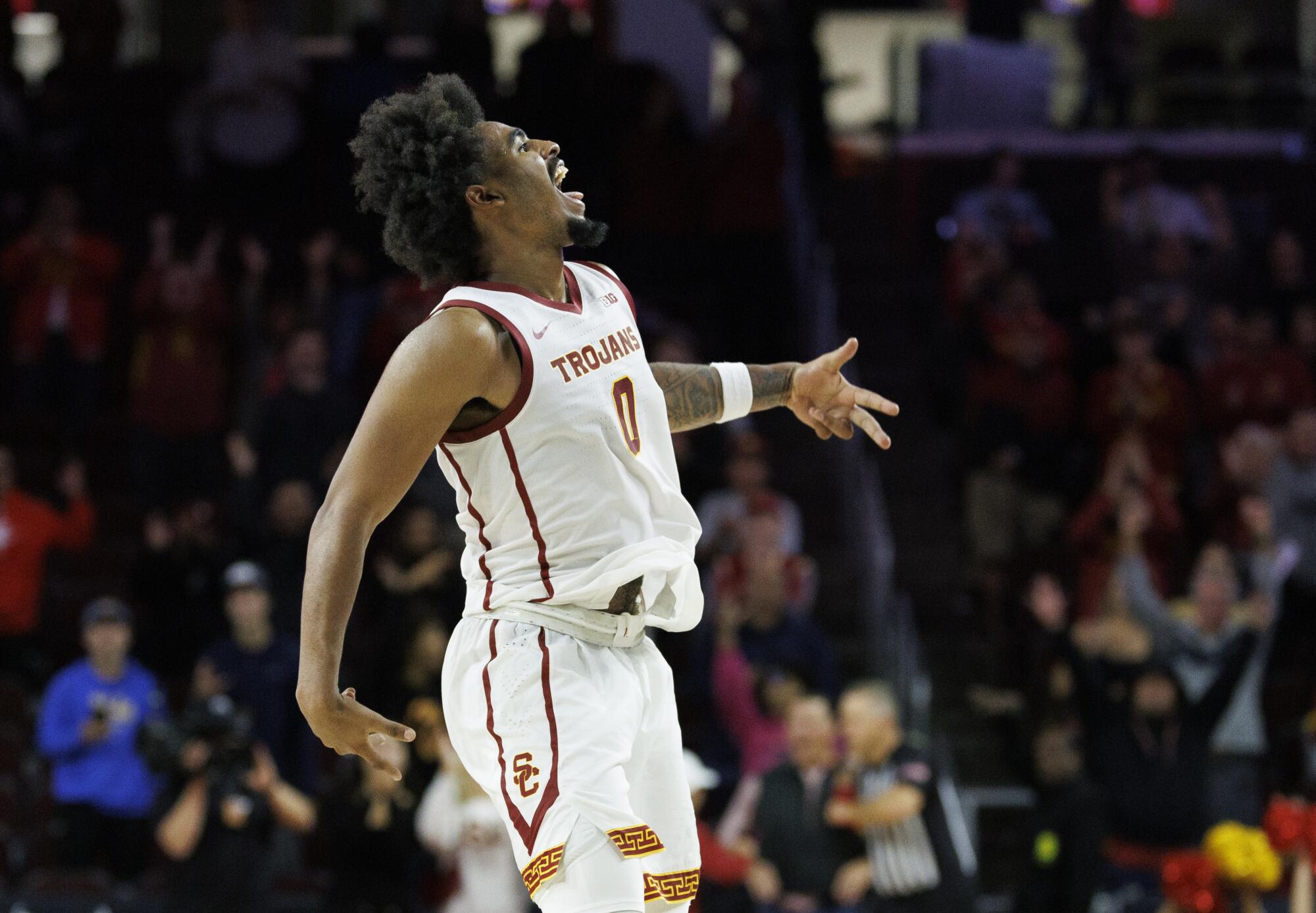 Saint Thomas celebrates after shooting a three-pointer to seal a 75-69 win over Idaho State on Nov. 7.