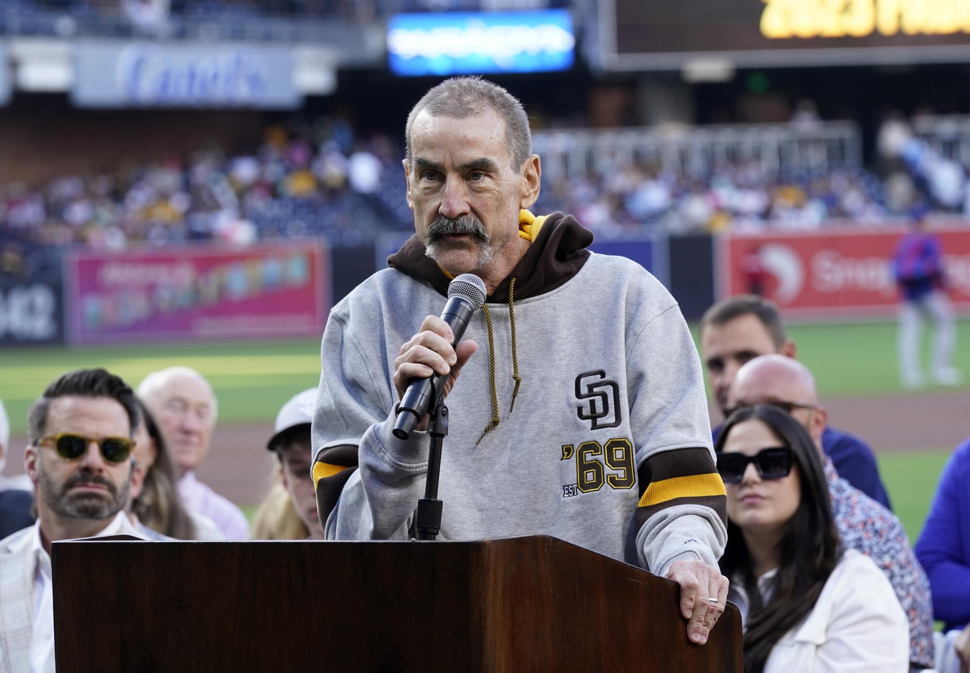 San Diego Padres owner Peter Seidler speaks during a Padres Hall of Fame ceremony at Petco Park in July 2023.