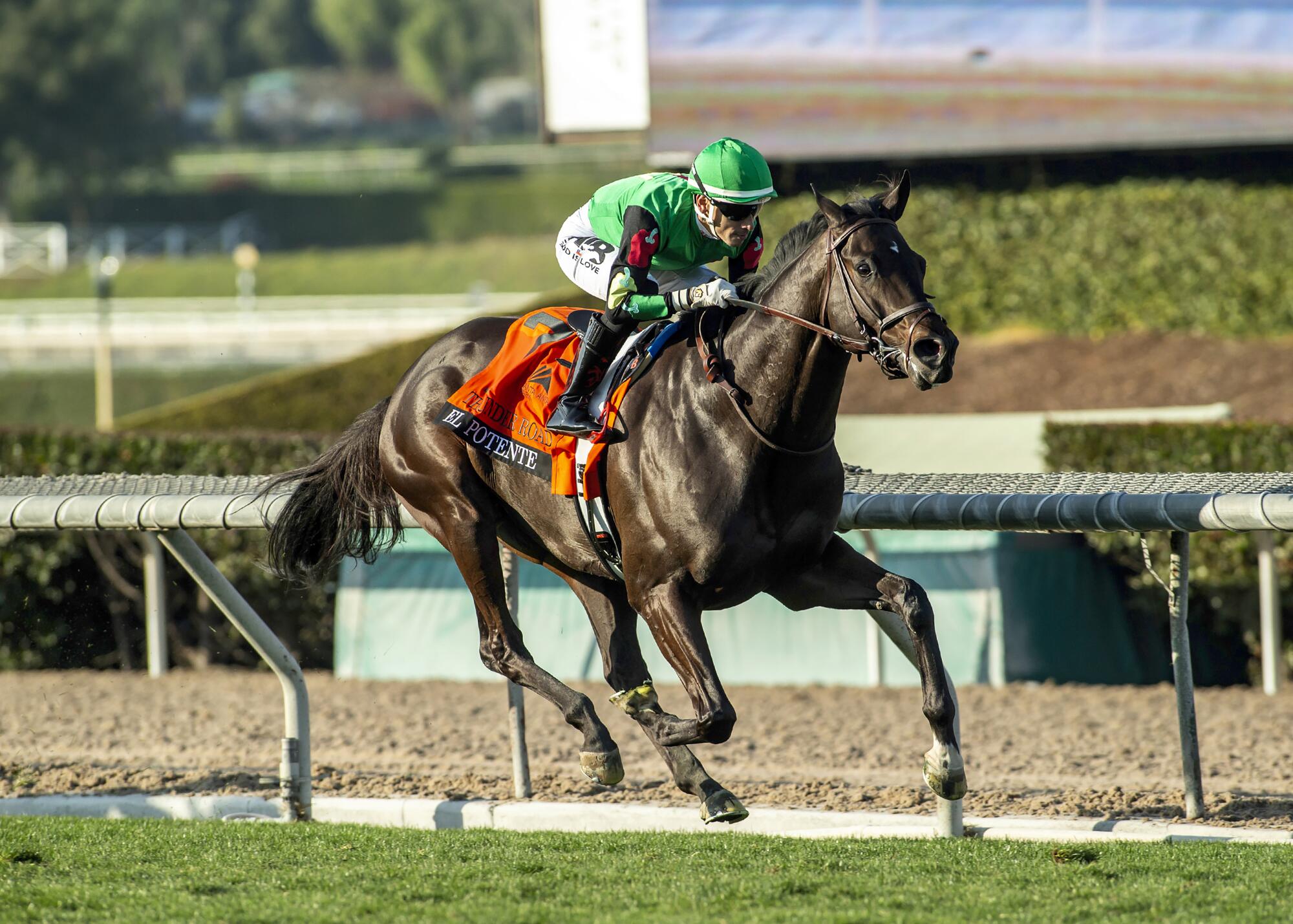 Jockey Hector I. Berrios steers El Potente to a win in the Grade III $100,000 Thunder Road Stakes horse race