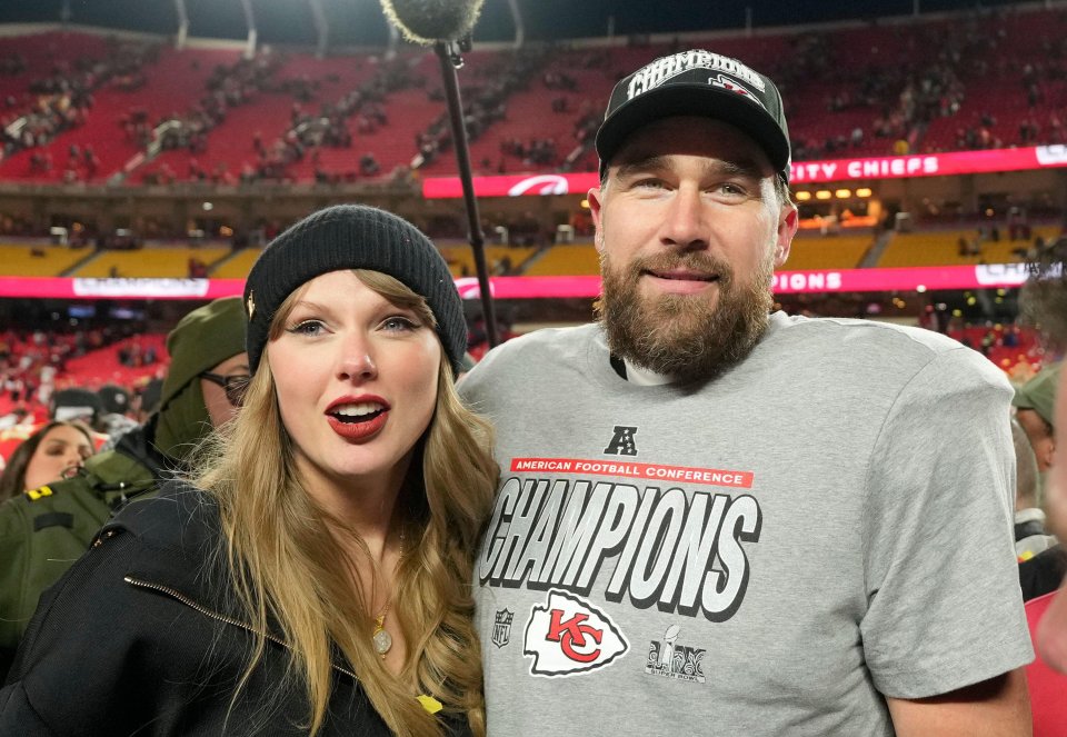 Travis Kelce kissing Taylor Swift after the AFC Championship Game.