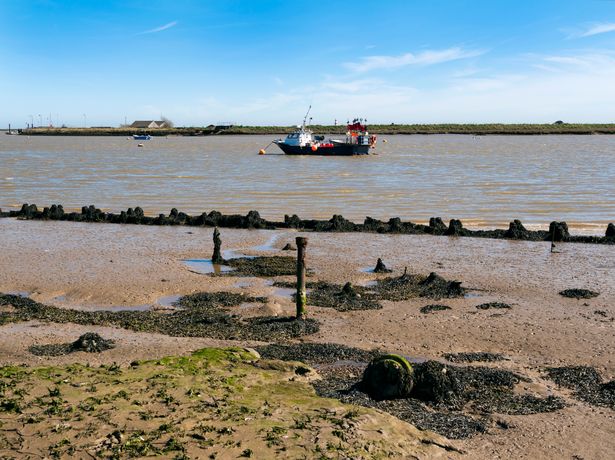 Orford Ness is a shingle spit running along the coast which houses a nature reserve and where the British Ministry of Defence conducted secret military tests during the Cold War