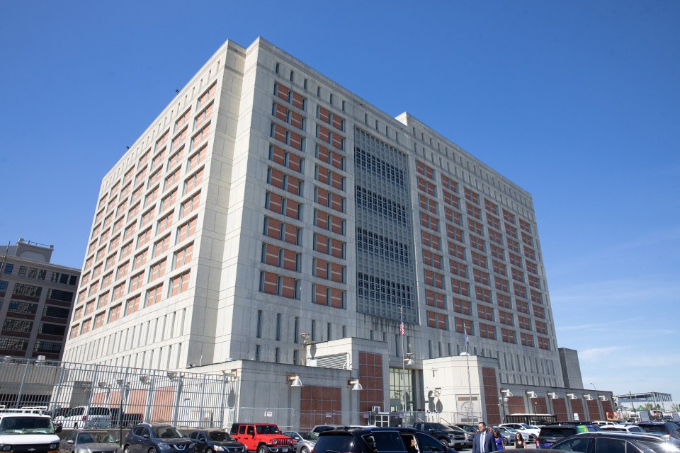 Exterior view of a large, multi-story prison building.