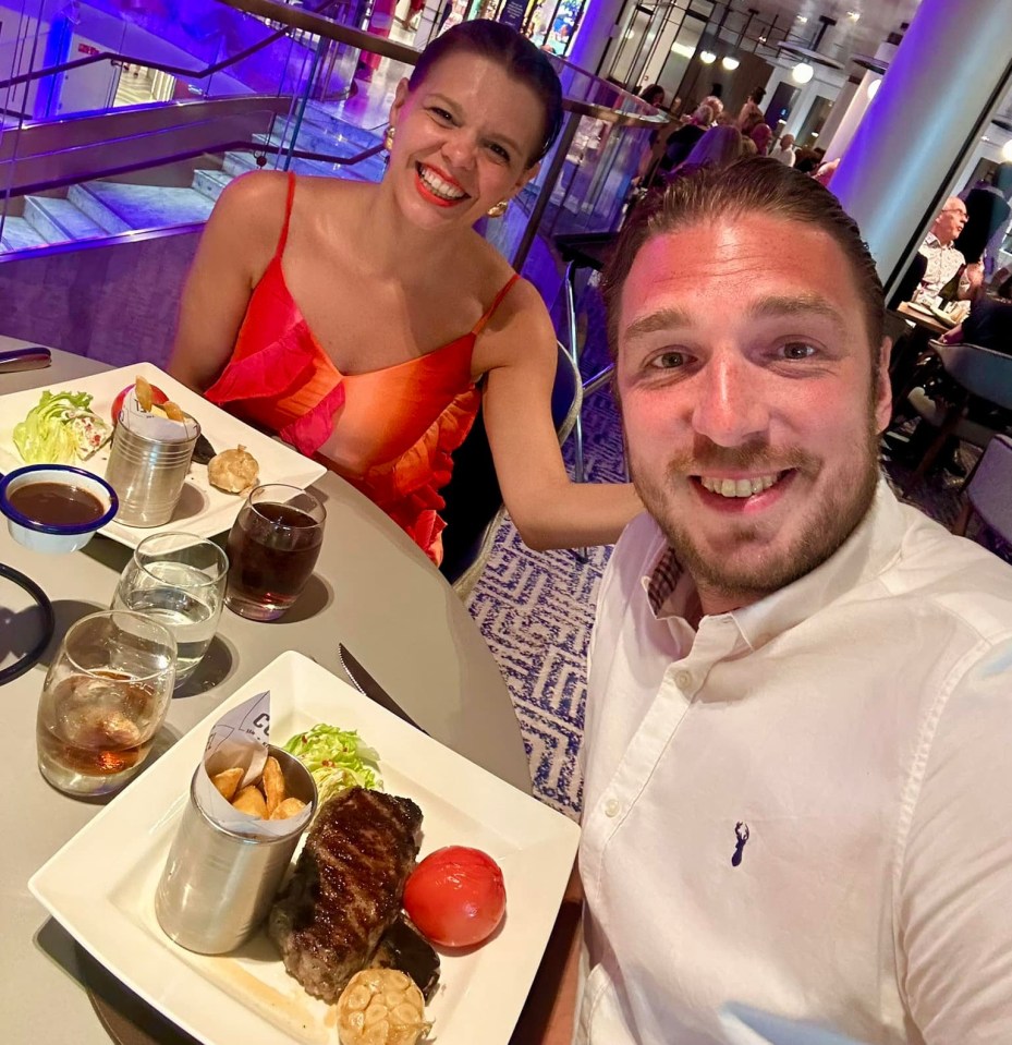 Couple enjoying a meal in a restaurant.