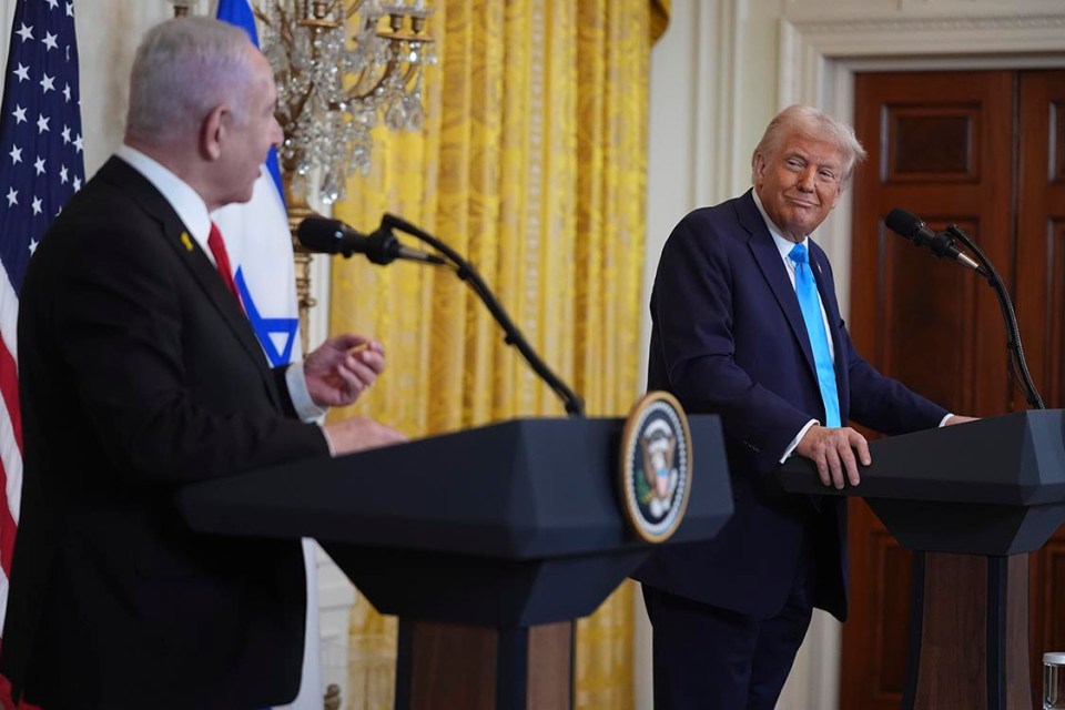 President Donald Trump listens as Israel's Prime Minister Benjamin Netanyahu speaks during a news conference in the East Room of the White House, Tuesday, Feb. 4, 2025, in Washington. (AP Photo/Evan Vucci)