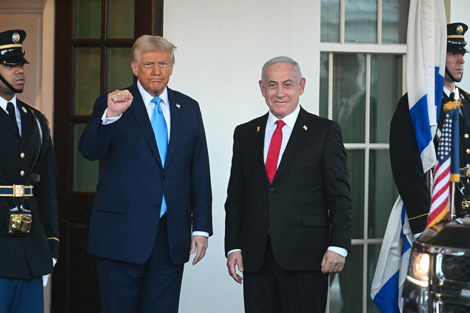 US President Donald Trump greets Israel's Prime Minister Benjamin Netanyahu as he arrives at the North Portico of the White House in Washington, DC, on February 4, 2025. (Photo by Jim WATSON / AFP) (Photo by JIM WATSON/AFP via Getty Images)