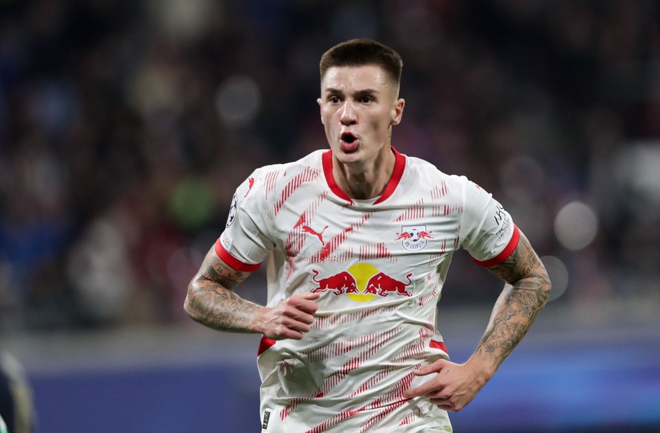 Benjamin Sesko of RB Leipzig celebrating after scoring a goal.