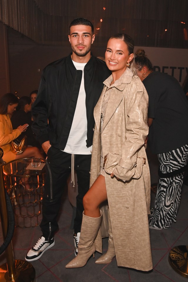 Tommy Fury and Molly-Mae Hague at a fashion event.