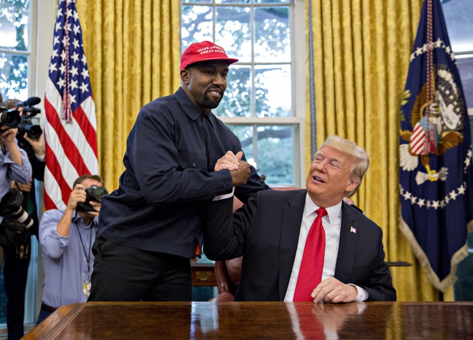 Kanye West and Donald Trump shaking hands in the Oval Office.