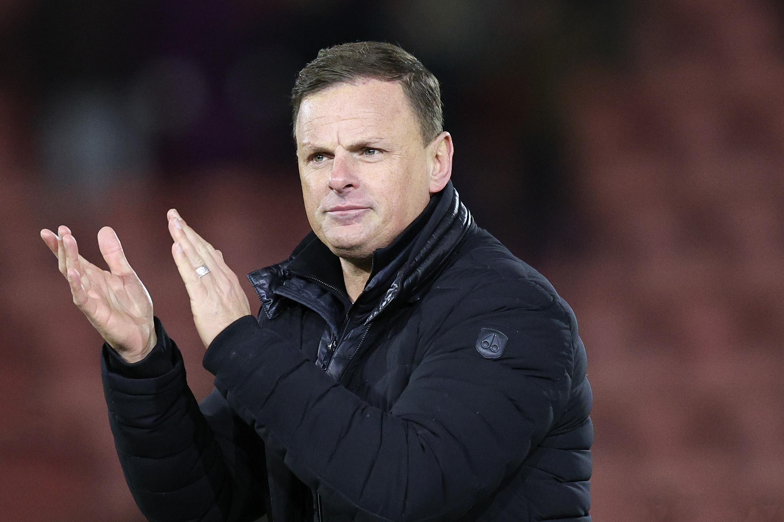 Richie Wellens, manager of Leyton Orient, applauding.