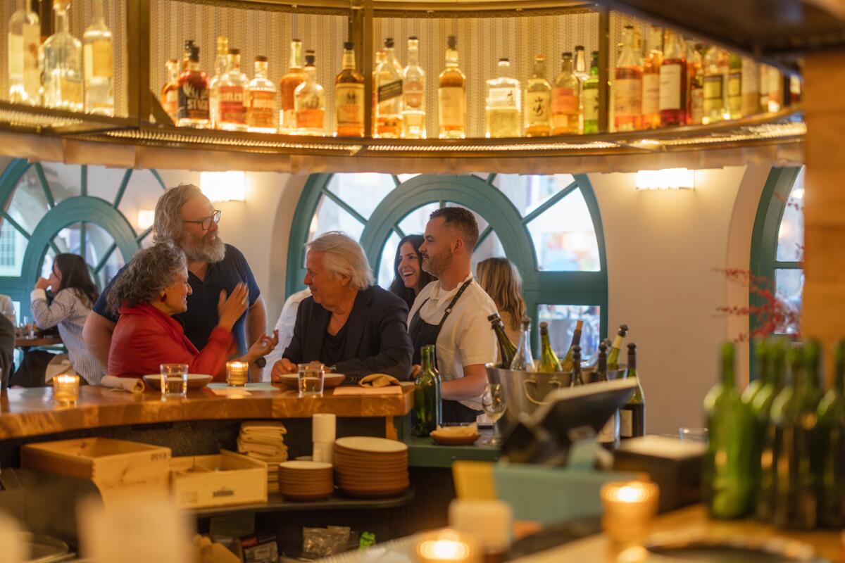 Bar Chelou's chef-owner Doug Rankin greeting guests at the Pasadena restaurant.