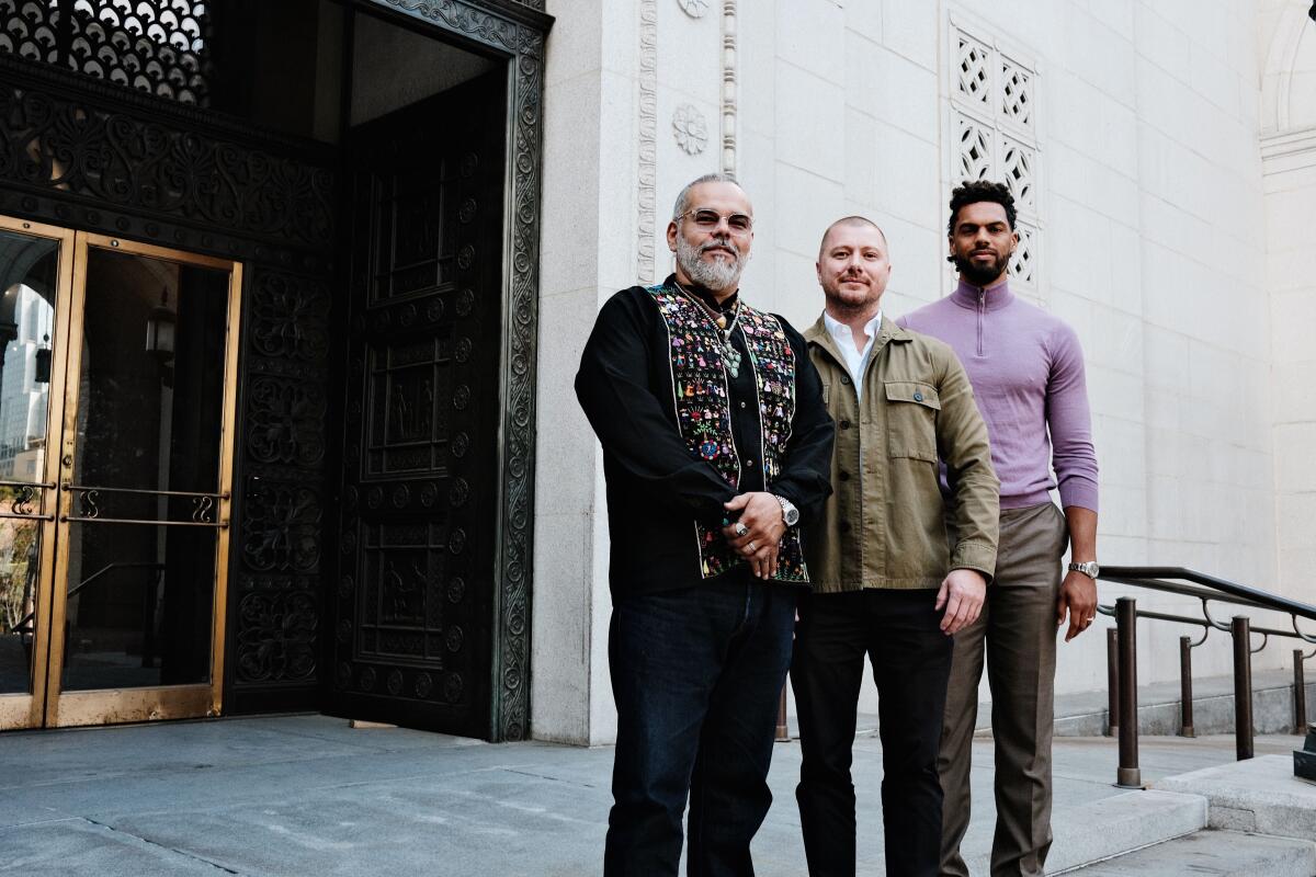 Three men stand on the entry steps of L.A.'s City Hall: Wes Avila, Giancarlo Panani and Trent Locket