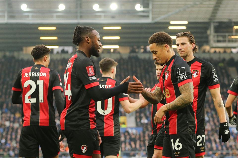 Bournemouth soccer players celebrating a goal.