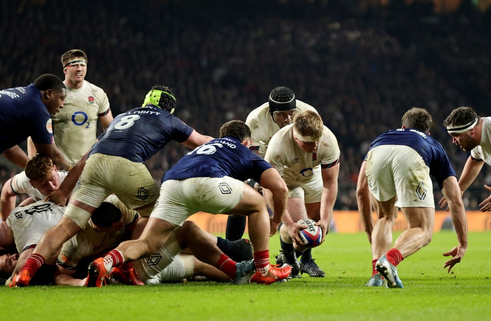 Rugby players in a scrum.